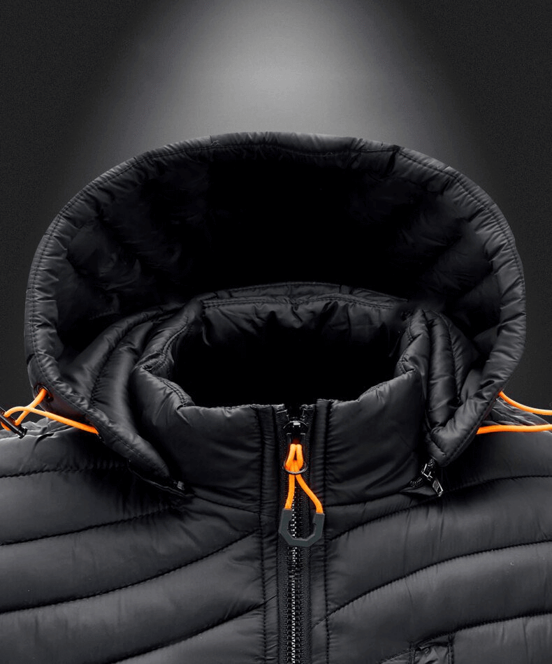 Stylish sports warmed men's vest with hood and zippered pockets, perfect for outdoor activities like hiking and traveling.